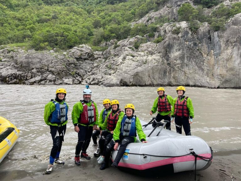 A group of people rafting in Vjosa river