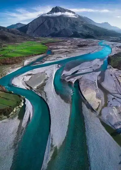 People rafting on the Vjosa River in Albania.