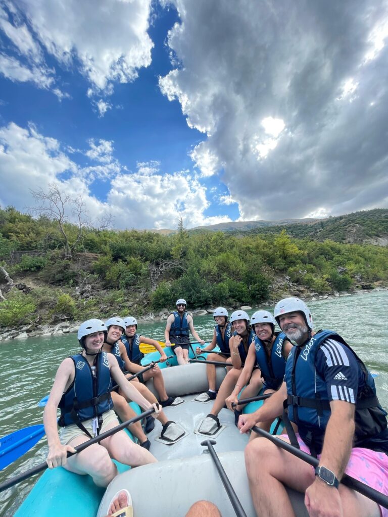 group of friends rafting in the vjosa river
